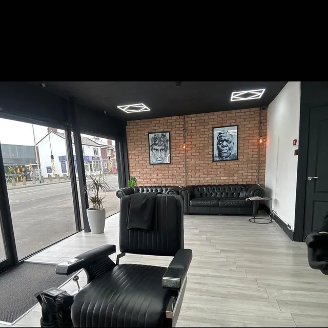 The SAM Barbers shopfront on Cheadle Road